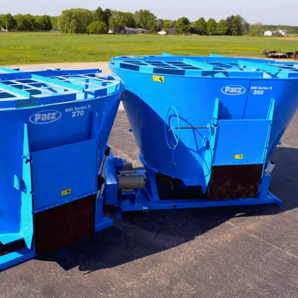 Both models of the Patz 800 Series Stationary TMR Mixer outside on asphalt.