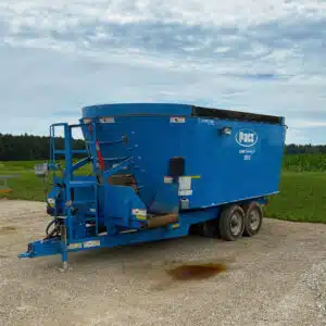 Used Patz 2400 Series II 950 trailer mixer with flat reverse discharge and tub magnet.