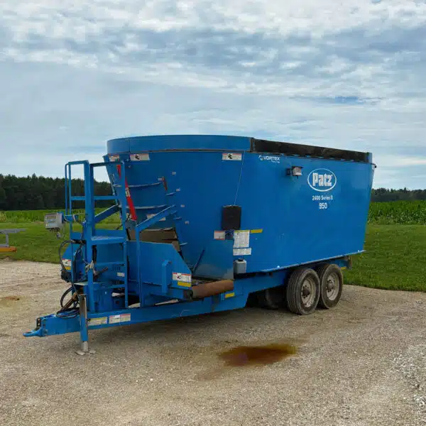 Used Patz 2400 Series II 950 trailer mixer with flat reverse discharge and tub magnet.
